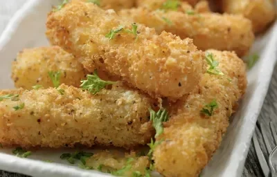 Deditos de hojaldre rellenos de maíz y queso Deditos de hojaldre rellenos de maíz y queso